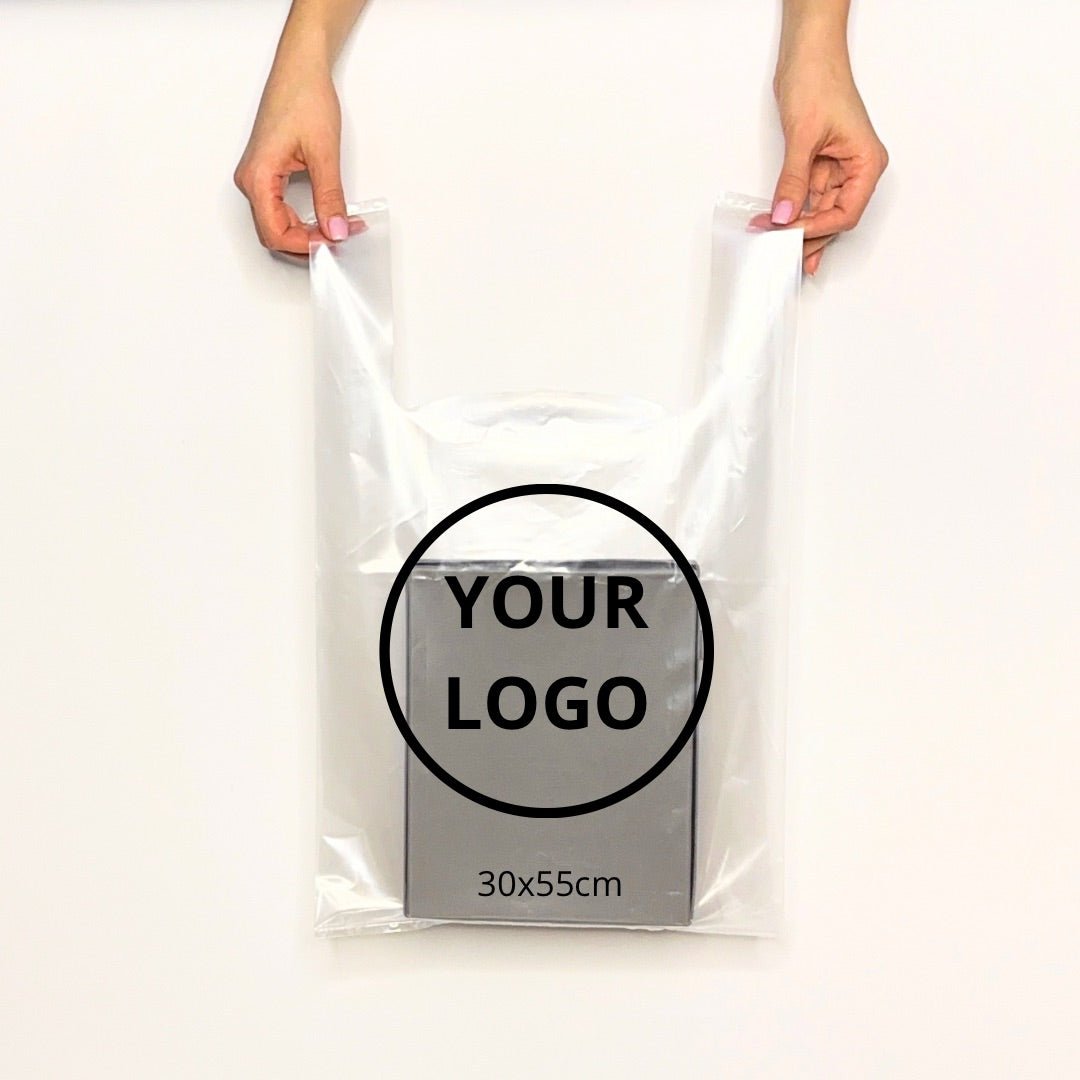 Transparent T-shirt bag with integrated handles for retail packaging